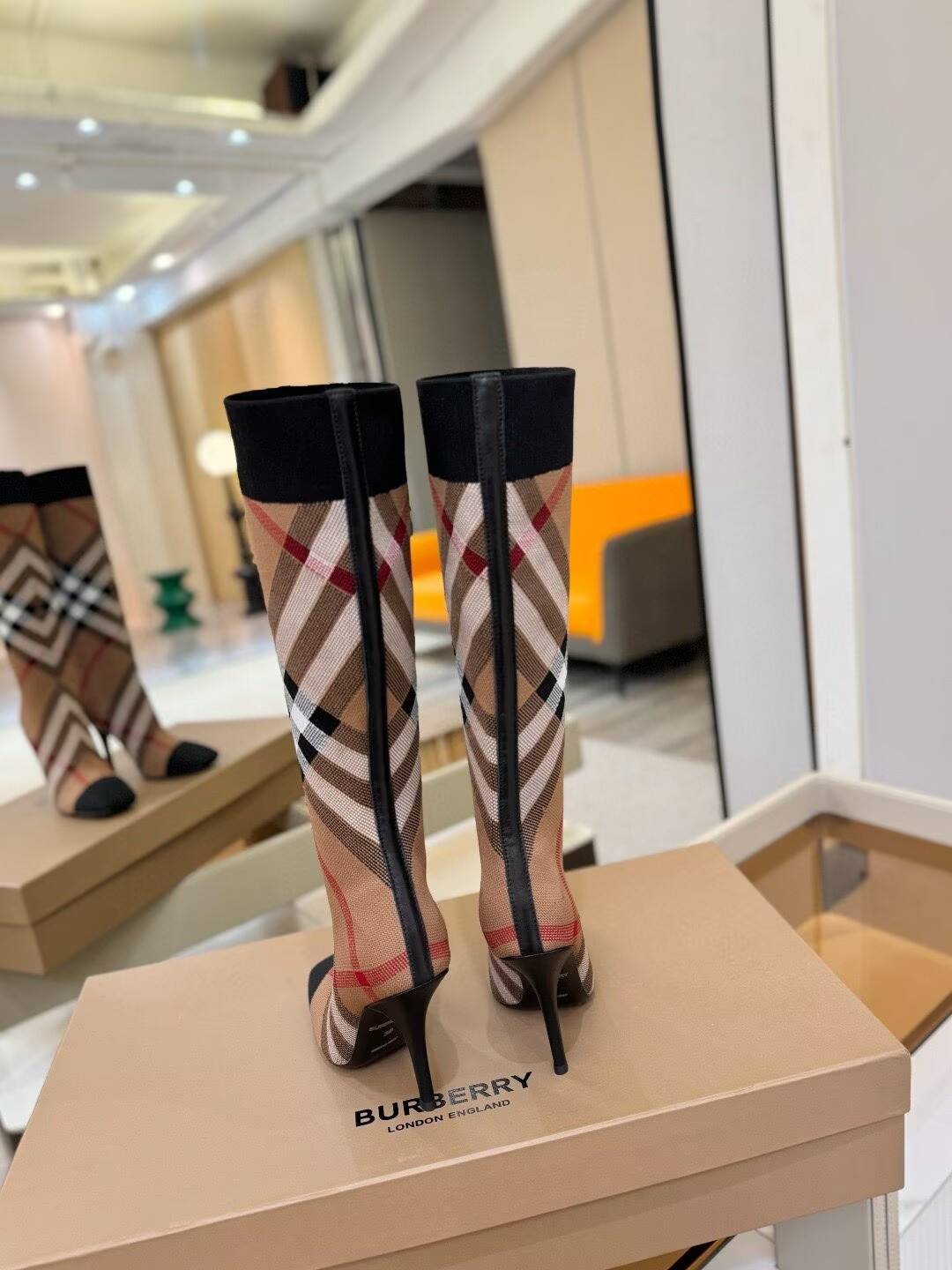 ua B**rry check high boots