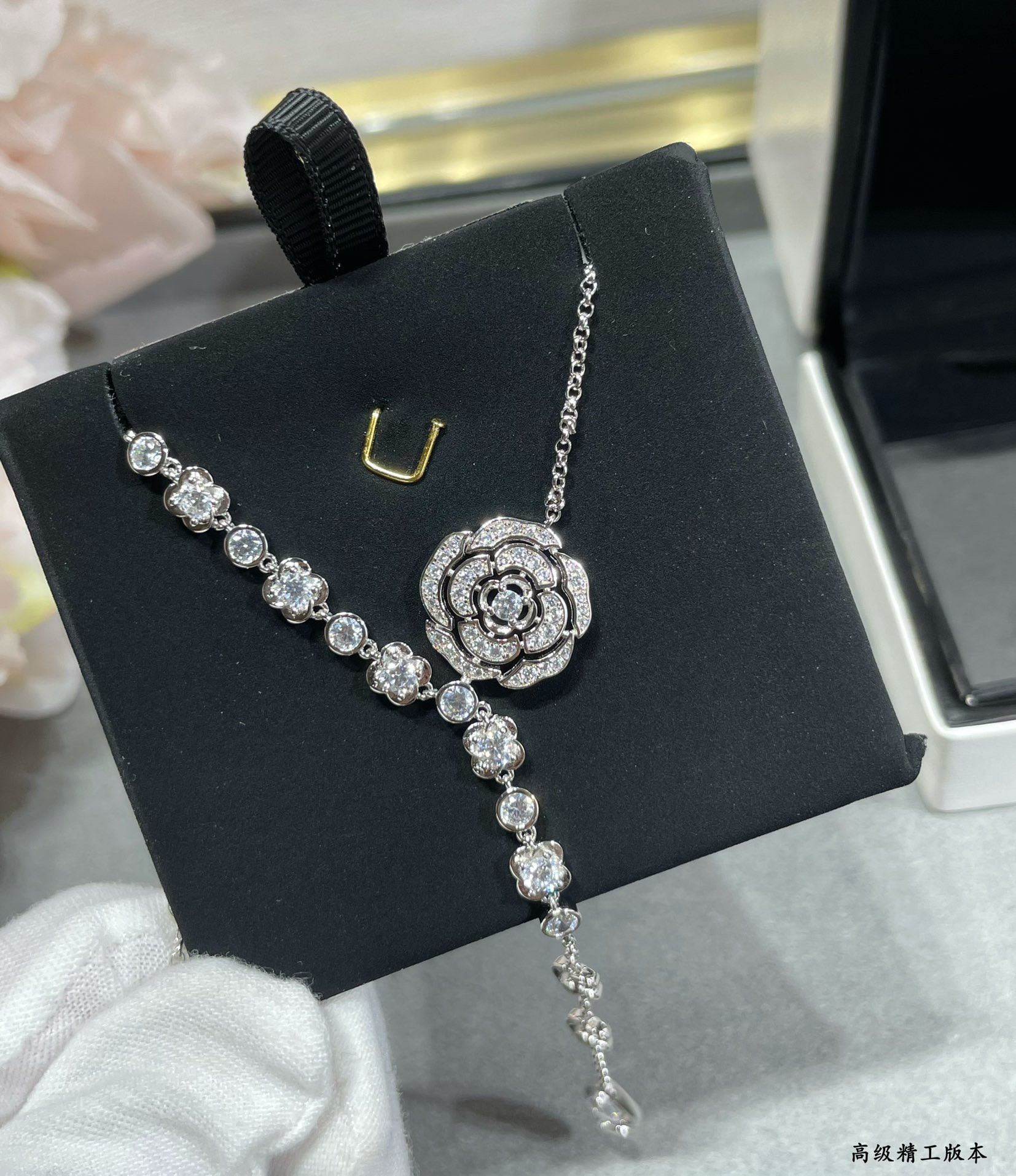 Ch*el camellia water drop tassel necklace