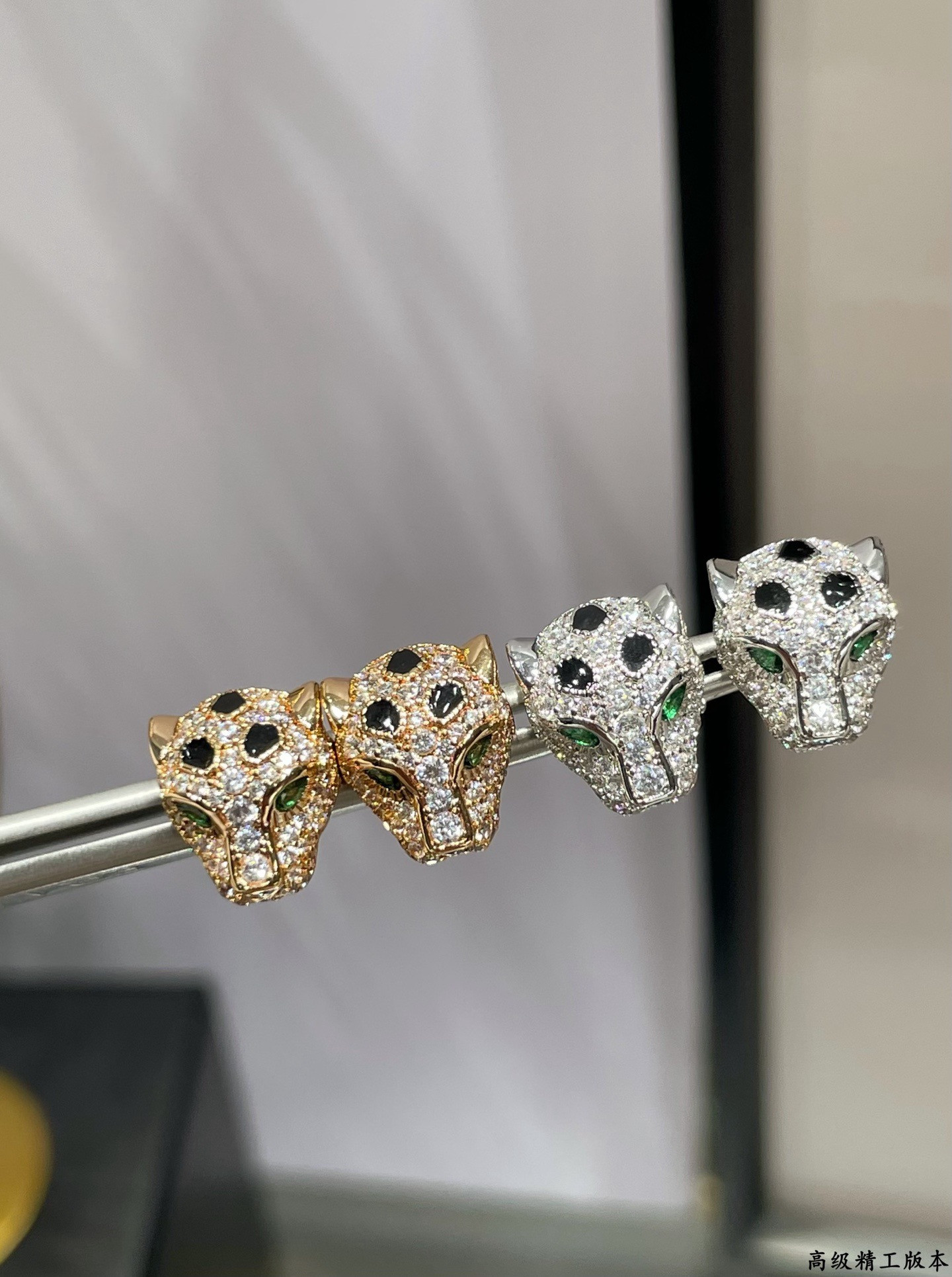 Ca*t*er earrings
