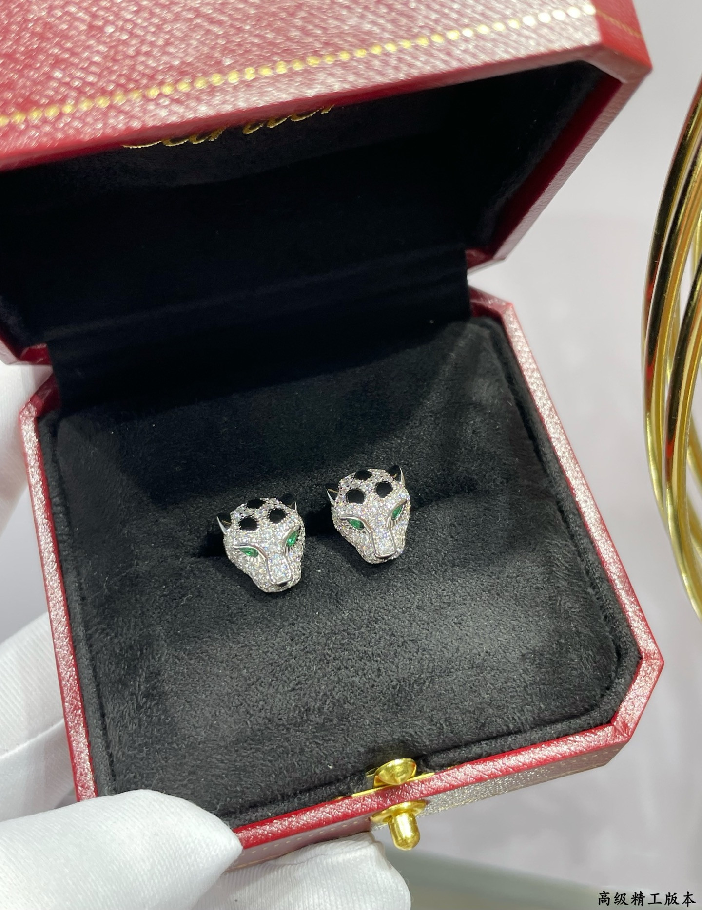 Ca*t*er earrings