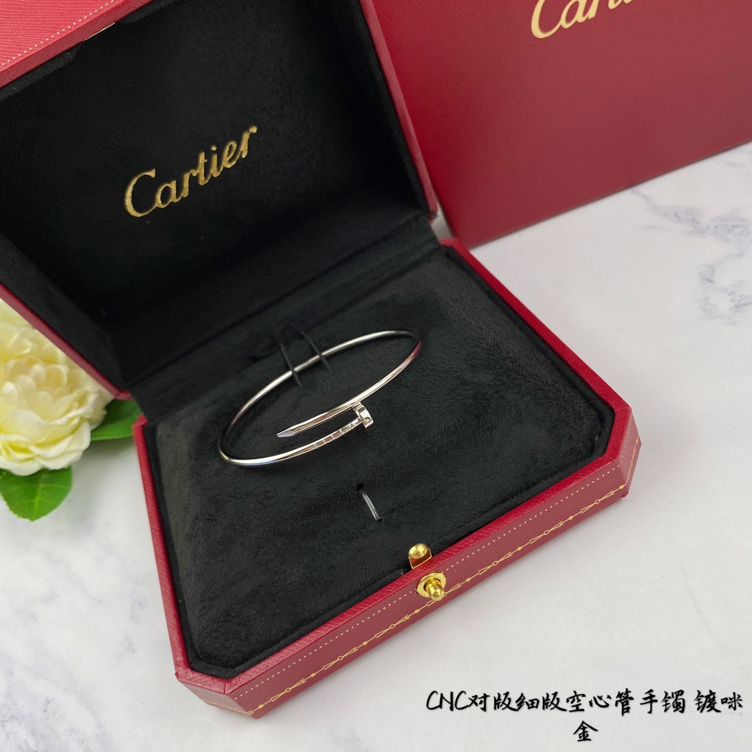 Ca*t*er thin hollow tube polished nail bracelet