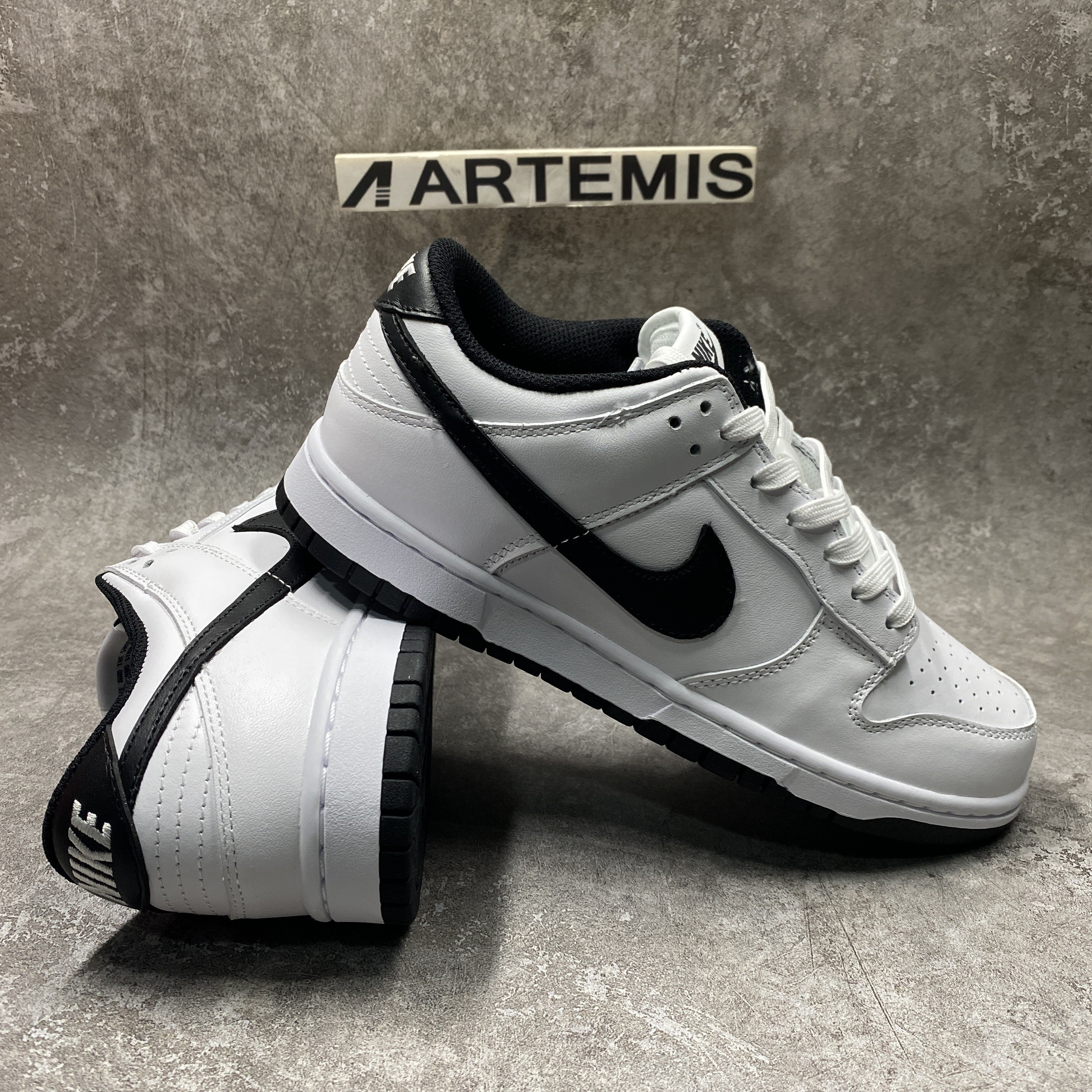 nike dunk low surF**es in clean white and black
