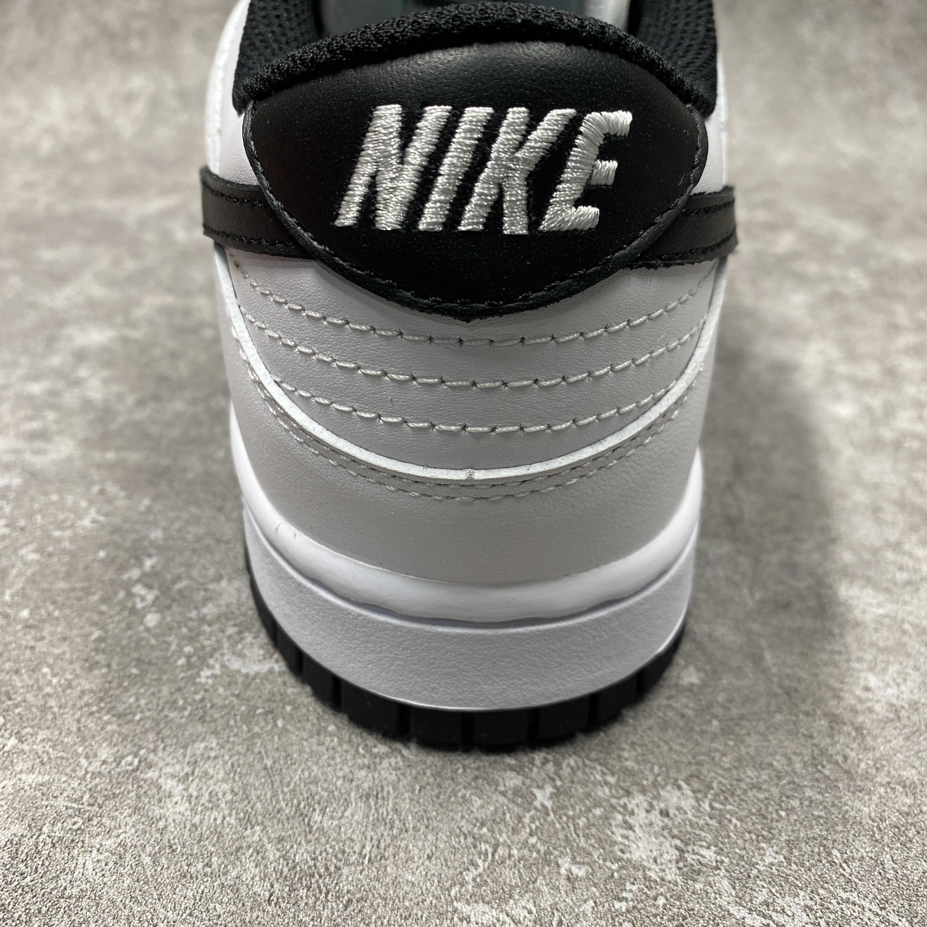 nike dunk low surF**es in clean white and black