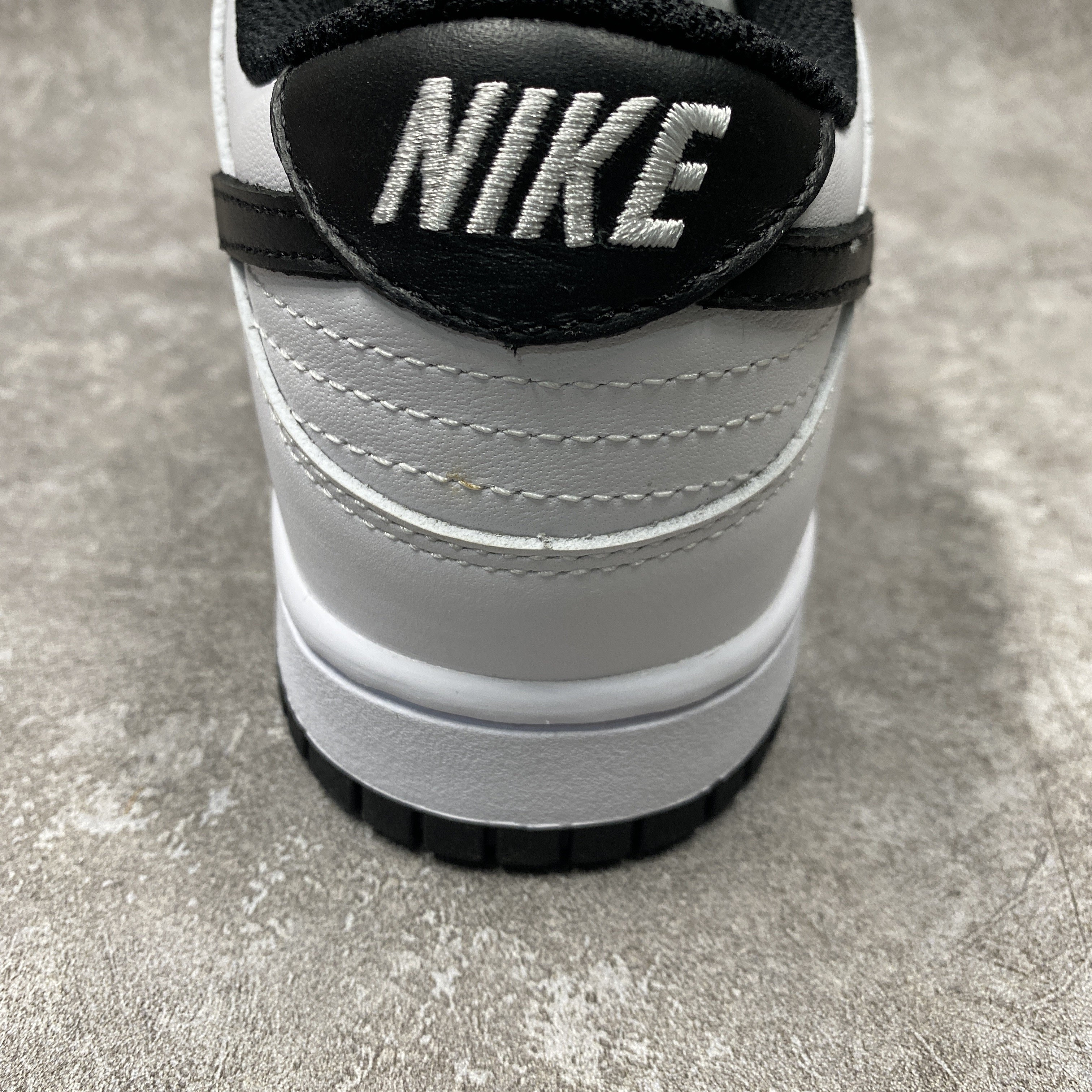 nike dunk low surF**es in clean white and black